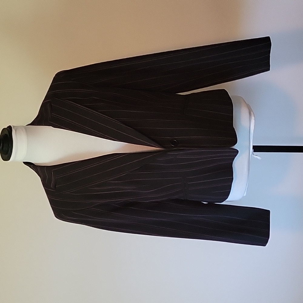 Bandolino black stretch jacket with fine mauve pinstripes. Laced fitting in back